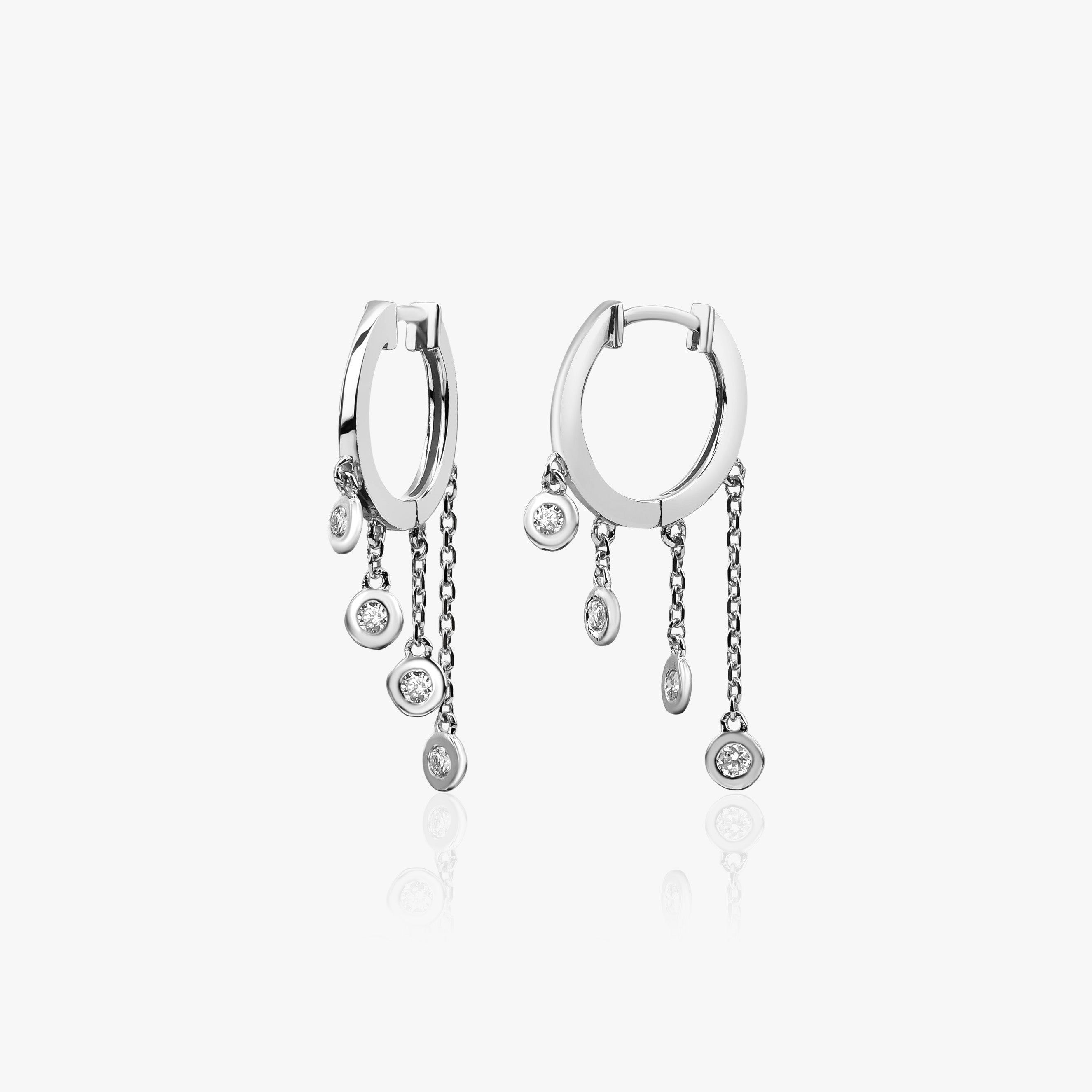 Diamond Huggie Hoops With Bezel Set Diamond Dangling Charms in 14K Gold